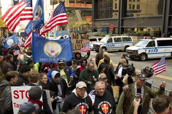 Anti-war US veterans march along with protesters for Occupy Wall Street at Zuccotti Park in New York.