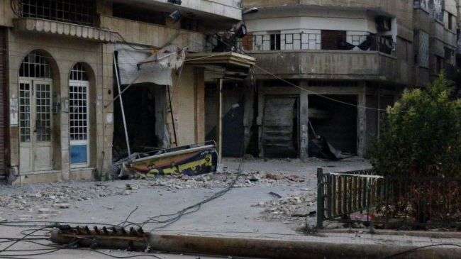 A handout image shows damaged buildings in the Syrian province of Homs.