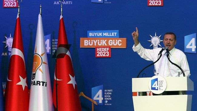 Turkish Prime Minister Recep Tayyip Erdogan delivers a speech during a congress of his ruling Justice and Development Party in Ankara on September 30, 2012.