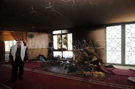 Israeli settlers burn mosque in Palestinian village