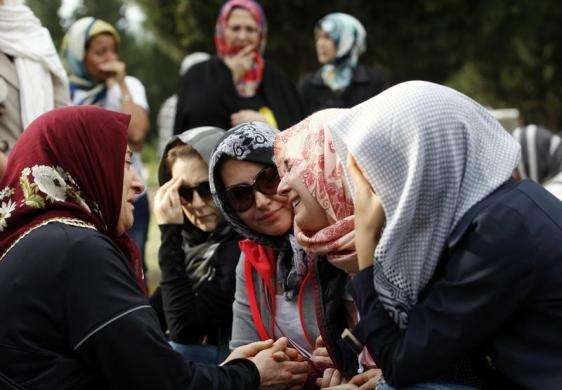 Women mourn during the funeral of a miner who died in a fire at a coal mine at a cemetery in Soma, a district in Turkey western province of Manisa May 14, 2014.
