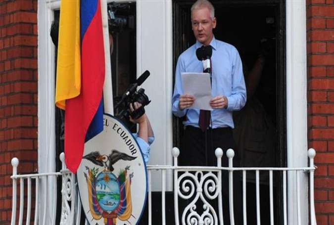 Wikileaks founder Julian Assange as he addresses members of the media and his supporters from the balcony of the Ecuadorian Embassy in London.