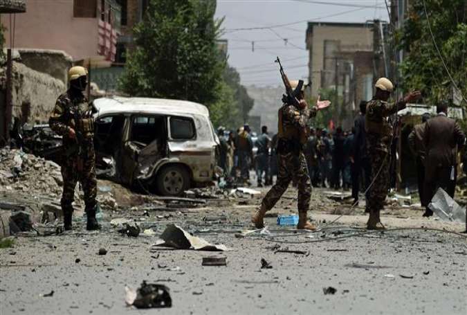 The Taliban militants have stepped up attacks in Afghanistan. Above, Afghan security personnel are seen arriving at the site of a bomb blast in Kabul, July 7, 2015.