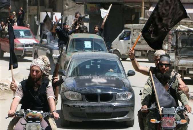 Al-Qaeda-affiliated al-Nusra Front militants in the northern Syrian city of Aleppo, May 26, 2015