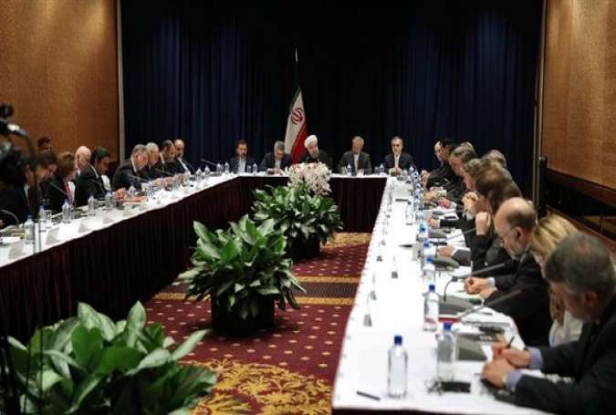 Iran’s President Hassan Rouhani holds a meeting with a group of senior editors from media organizations in New York, September 25, 2015.