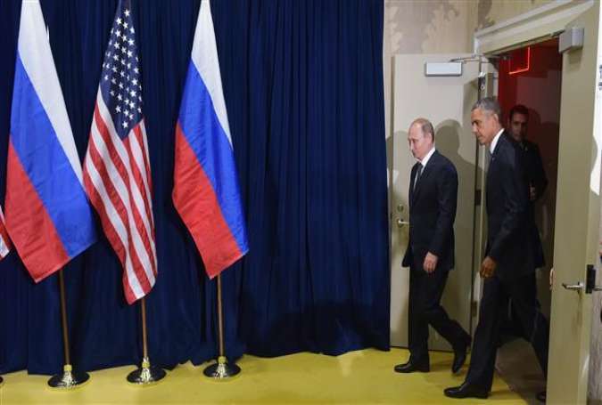 US President Barack Obama, right, and Russia’s President Vladimir Putin arrive to pose for a photo ahead of a bilateral meeting at the United Nations headquarters on September 28, 2015, New York.
