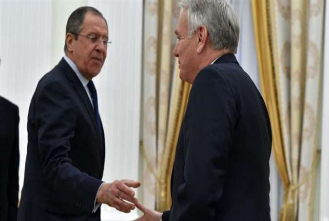 Russian Foreign Minister Sergei Lavrov (L) shakes hands with French Foreign Minister Jean-Marc Ayrault prior to a meeting in Moscow, April 19, 2016.
