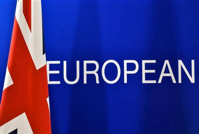 A British flag is seen next to the word "European", during a press conference of British Prime minister on June 28, 2016 in Brussels.