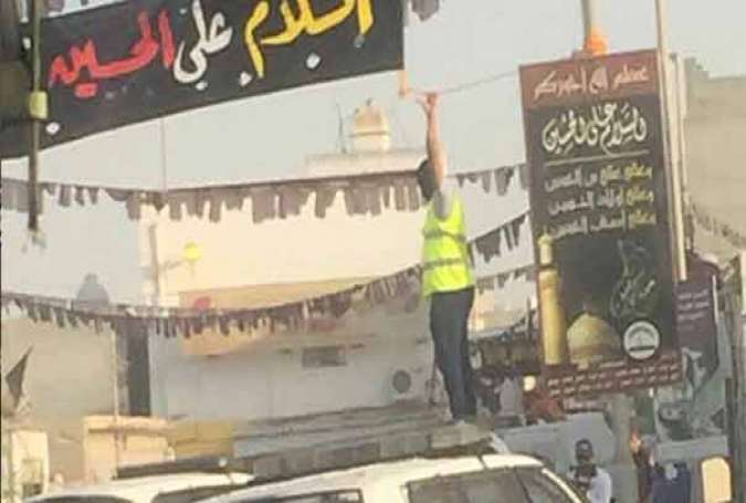 اهتزار پرچم های عزای امام حسین علیه السلام در منطقه ی تحت محاصره ی الدراز بحرین