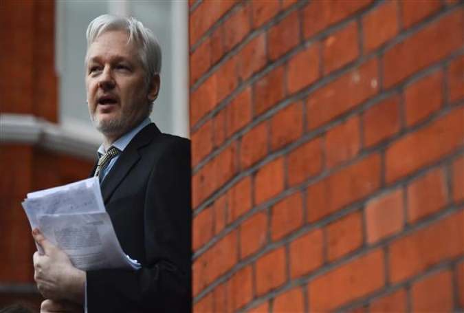 In the file photo WikiLeaks founder Julian Assange is seen addressing the media from the balcony of the Ecuadorian Embassy in London.