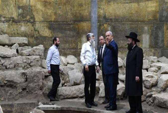 Israel Prime Minister Benjamin Netanyahu (second-right) seen at the Western Wall tunnels in East Jerusalem al-Quds, before the start of a special weekly cabinet meeting on May 28, 2017. (Photo via GPO)