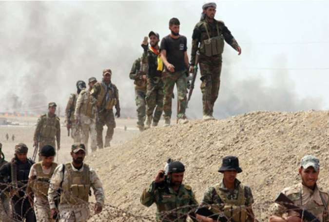 ورود نیروهای حشد شعبی به مرکز ناحیه «عکاشات» در غرب عراق