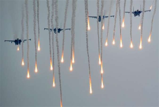 Military jets fly during the joint Russian-Belarusian military exercises Zapad-2017 (West-2017) at a training ground near the town of Borisov on September 20, 2017. (Photo by AFP)