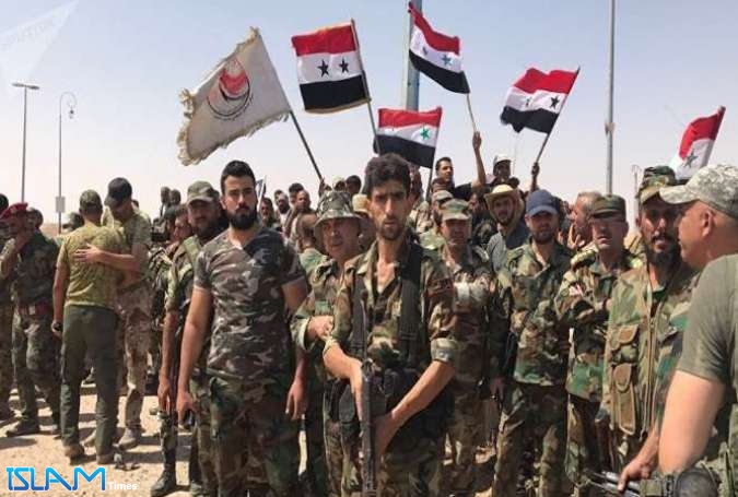 Syrian troops celebrating victory against terrorists
