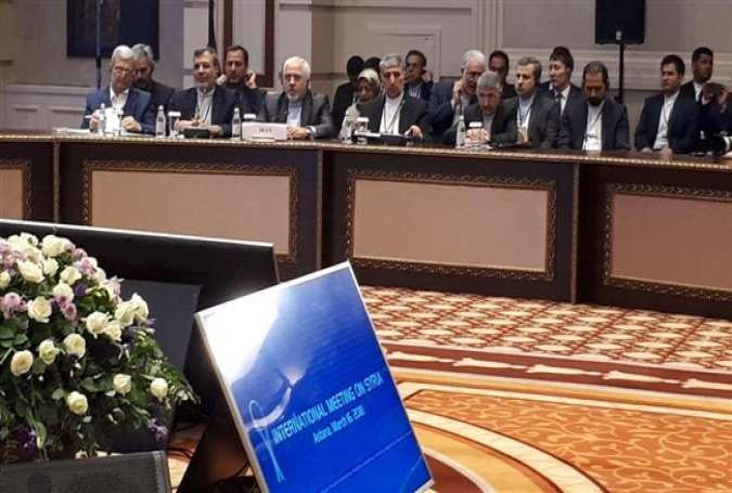 Picture taken in the Kazakh capital Astana on March 16, 2018 shows the Iranian delegation to Syria talks featuring Foreign Minister Mohammad Javad Zarif (3rd L)