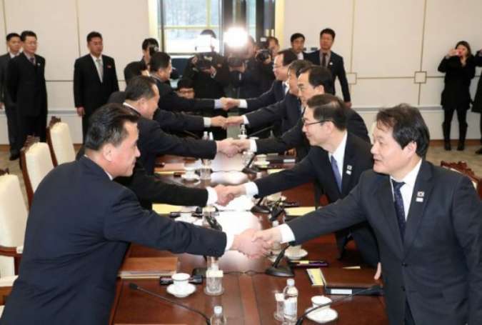 Delegasi Korea Selatan dan Utara.