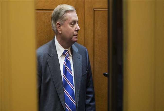 Senator Lindsey Graham (R-SC) stands in an elevator in the Senate Basement on Capitol Hill on April 10, 2018 in Washington, DC. (Photo by AFP)