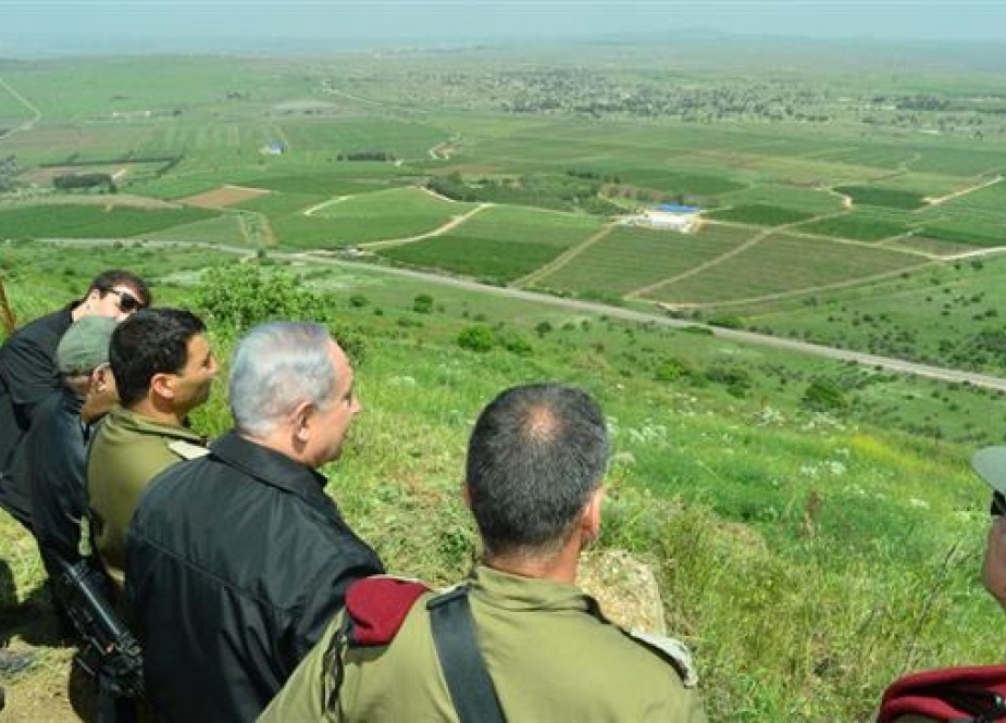Israeli PM Benjamin Netanyahu (3rd R) is seen during a tour in the occupied Golan Heights, April 11, 2016.