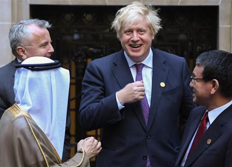 Ministers of Foreign Affairs from Saudi Arabia Adel Al-Jubeir (L) speaks with his Japanese counterpart Tara Kono, United States Deputy Secretary of State John Sullivan (L second raw) and British Secretary of State for Foreign Affairs Boris Johnson after posing for a family photo at Palacio San Martin during the G20 foreign ministers