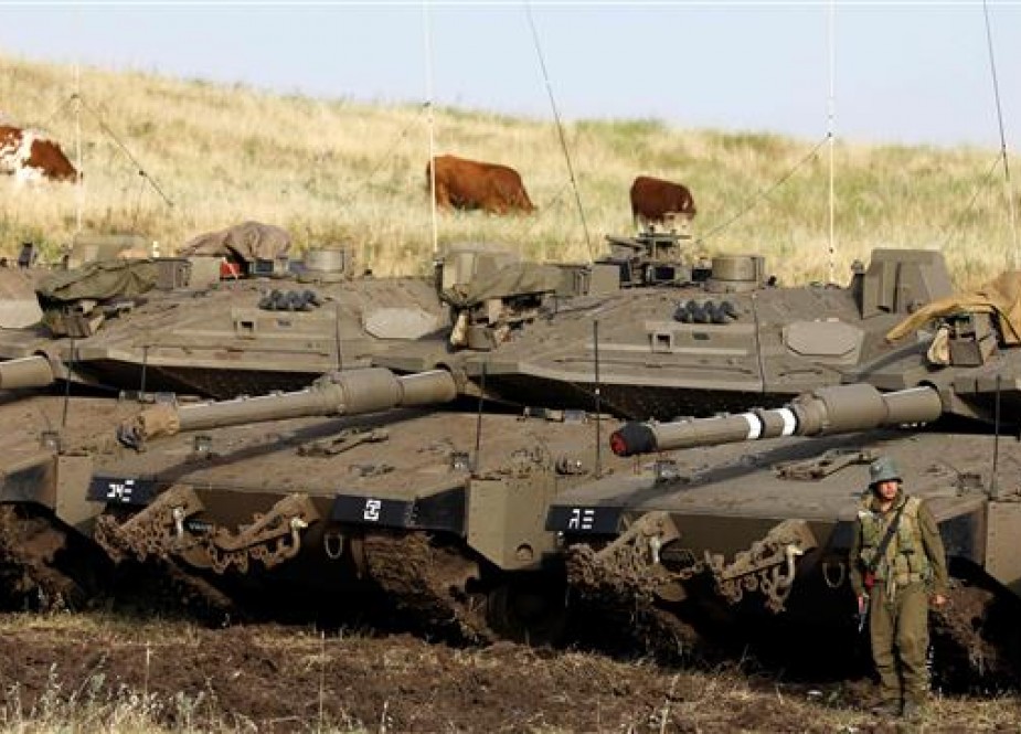 Merkava Mark IV tanks are deployed to near the Syrian border in the Israel-occupied Golan Heights.jpg