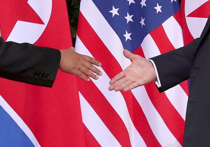 President Donald Trump shakes hands with North Korean leader Kim Jong Un at the Capella Hotel on Sentosa island in Singapore.