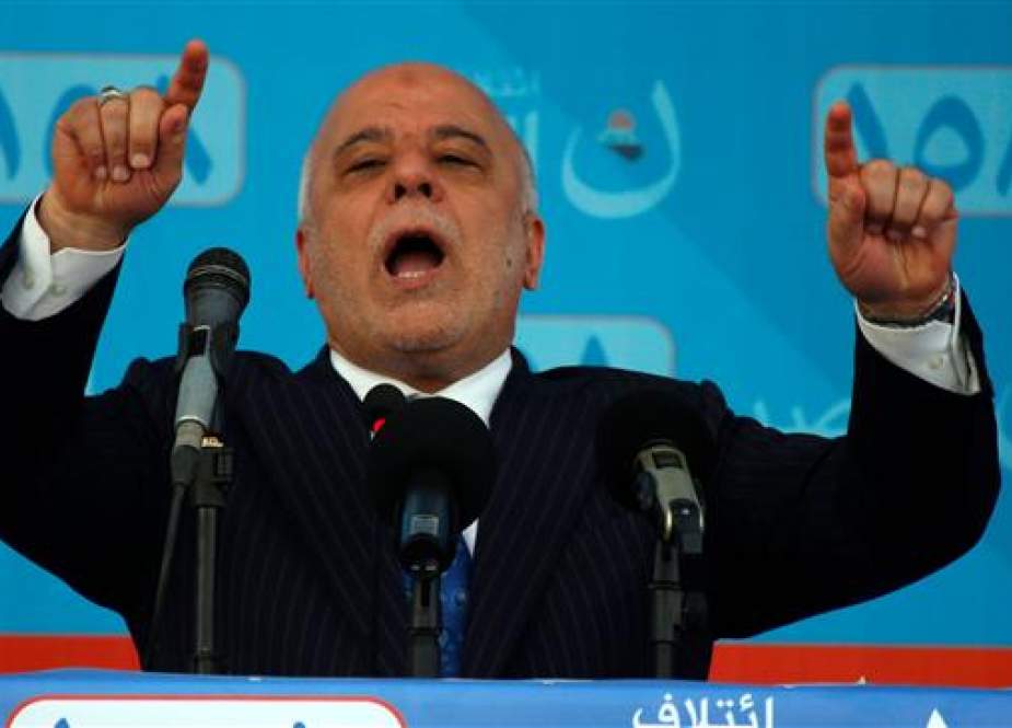 Iraqi Prime Minister Haider al-Abadi talks during a campaign rally in the holy city of Najaf, May 3, 2018. (Photo by AFP)