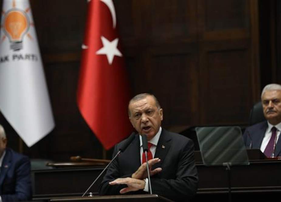 Turkish President Recep Tayyip Erdogan addresses members of parliament in Ankara, Turkey, July 7, 2018. (Photo by AFP)