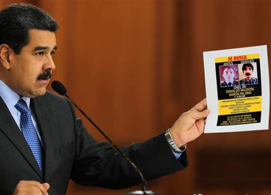 A handout picture released by the Venezuelan presidency shows Venezuelan President Nicolas Maduro speaking during the broadcasting of a television program, at the Miraflores presidential palace in Caracas, on August 7, 2018. (Via AFP)