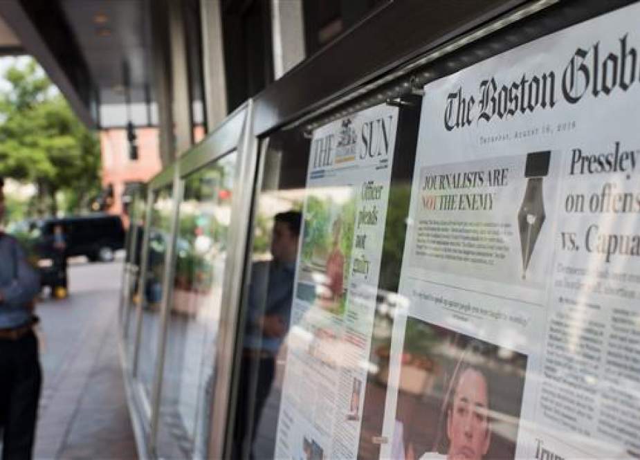 The front page of the Boston Globe August 16, 2018 edition is on display outside the Newseum in Washington DC on August 16,2018. (AFP photo)