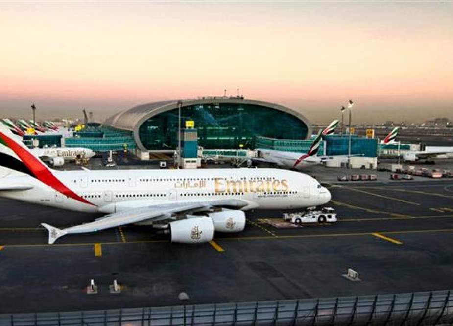 This file picture shows a view of Emirates Airline passenger planes at Dubai International Airport, the United Arab Emirates.
