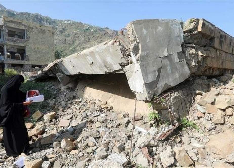Damage at the site of an airstrike on a school in Ta