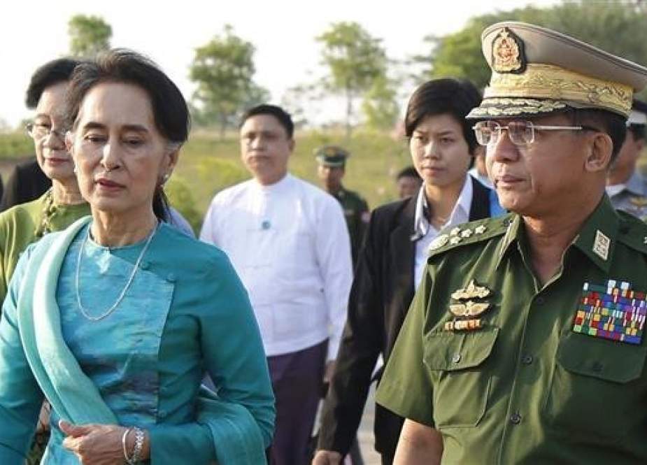 Myanmar’s military chief Min Aung Hlaing is seen alongside the country’s de facto leader Aung San Suu Kyi in this file photo.