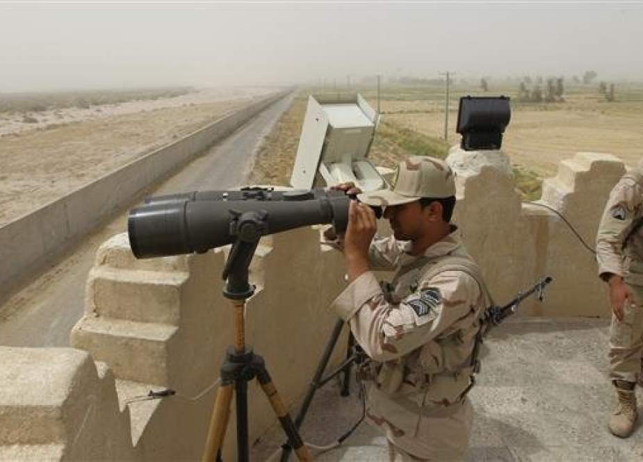 Iranian guards in a border tower watch in South Khorasan province.jpg