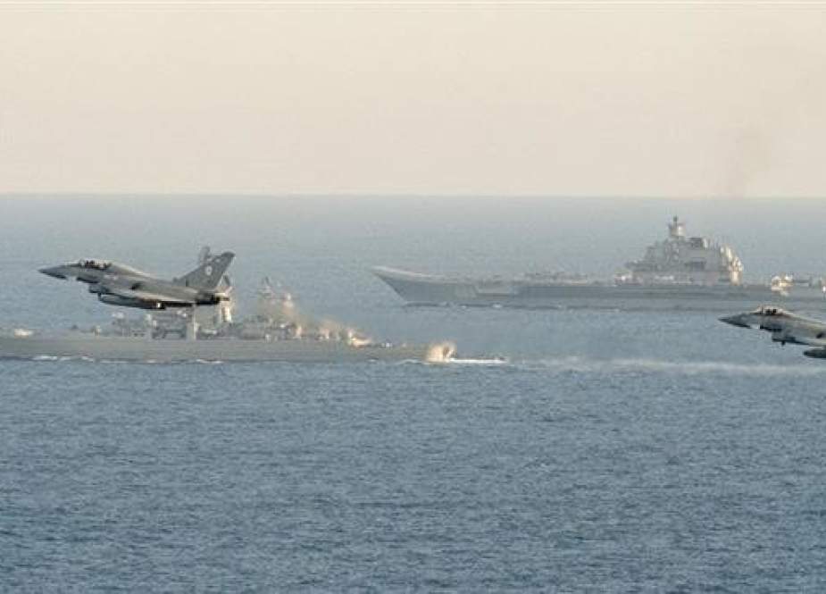 British Navy and Air Force escort Russian warships Admiral Kuznetsov and Pyotr Veliky in this file photo published by Sputnik.