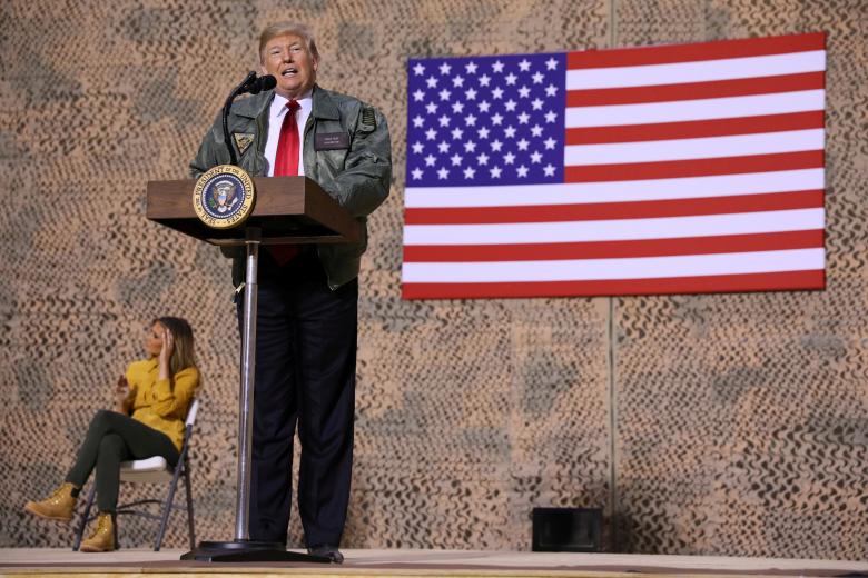 President Donald Trump delivers remarks to U.S. troops in an unannounced visit to Al Asad Air Base, Iraq.