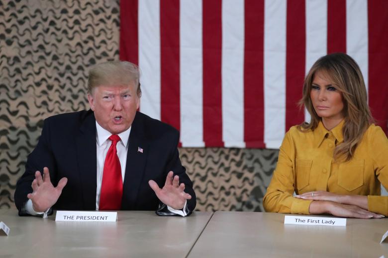 President Donald Trump, traveling with first lady Melania Trump, meets political and military leaders and makes a policy speech to U.S. troops in an unannounced visit to Al Asad Air Base, Iraq.