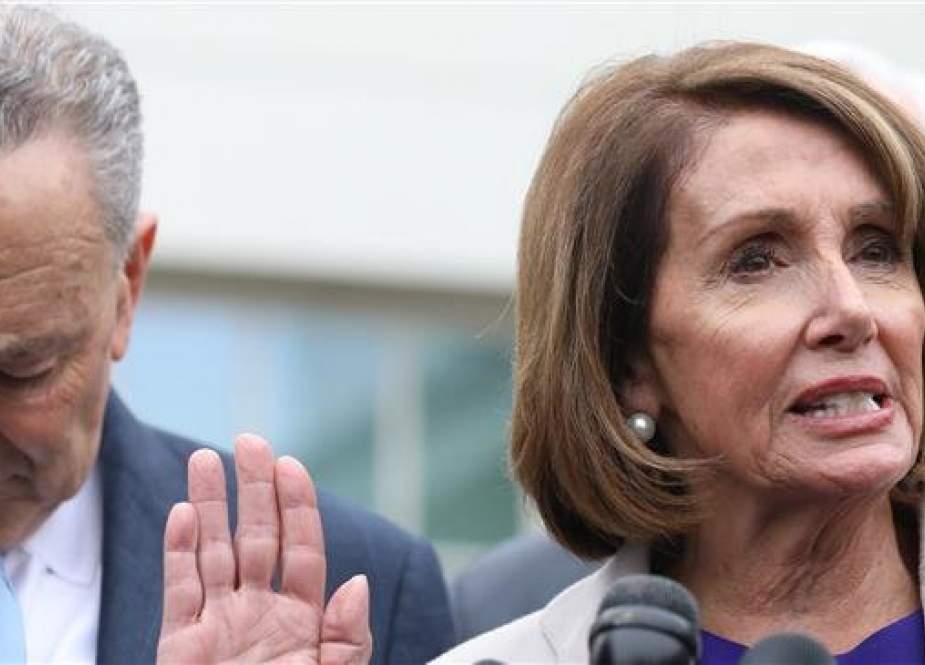 House Speaker Nancy Pelosi (D-CA) and Senate Minority Leader Chuck Schumer, D-NY, speak to the media outside the White House, January 4, 2019 in Washington, DC. (Photo by AFP)