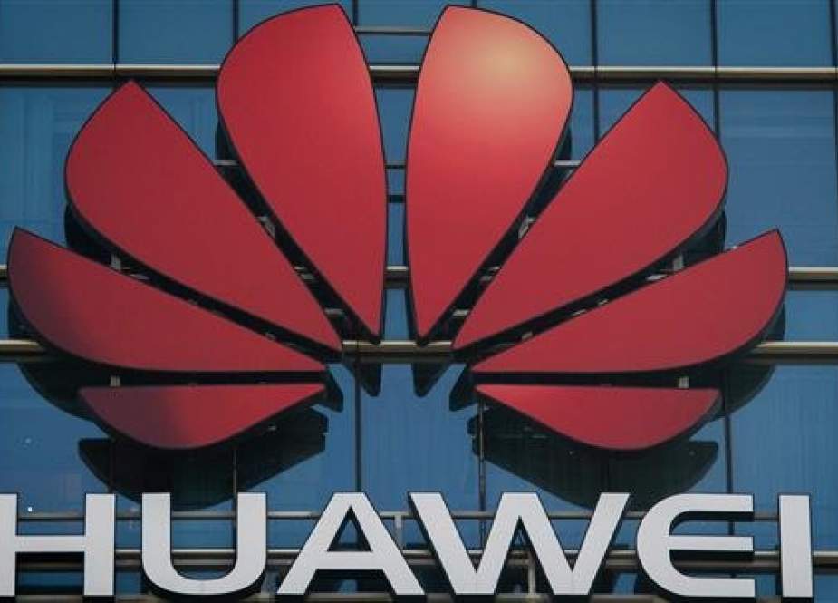 The Huawei logo is seen on a corporate office building in Dongguan, in China’s southern Guangdong Province. (File photo by AFP)