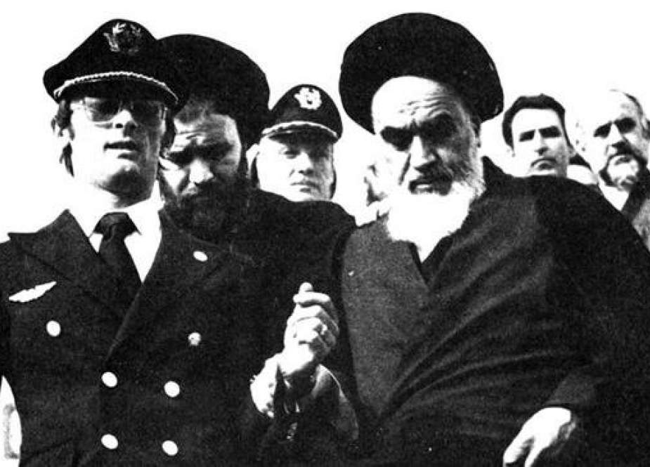 The late founder of the Islamic Republic, Ayatollah Seyyed Rouhollah Khomeini, disembarks from an Air France jet on returning home after more than 14 years in exile, in the Iranian capital, Tehran, February 1, 1979.