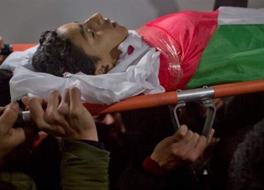 Palestinians bury 14-year-old killed during Gaza protest