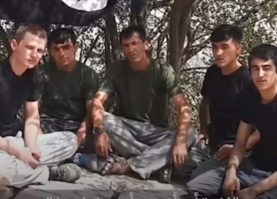 An image from a video released by Daesh purports to show members of the Takfiri terrorist group in Tajikistan.