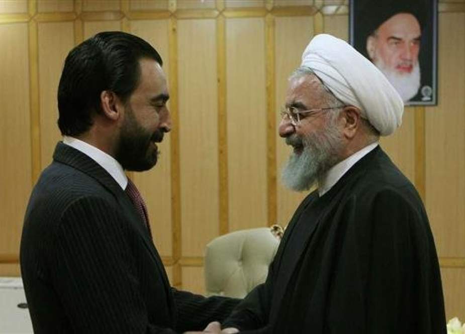 Iranian President Hassan Rouhani (R) meets with Iraqi Parliament Speaker Mohamed al-Halbousi on the sidelines of his visit to the northern Iranian province of Gilan, March 6, 2019. (Photo by IRNA)