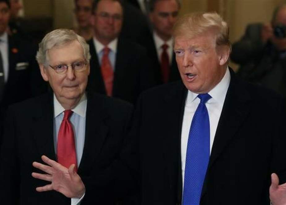 US President Donald Trump (R) speaks to the media while flanked by Senate Majority Leader Mitch McConnell after a Senate Republican weekly policy meeting at the US Capitol March 26, 2019. (AFP photo)