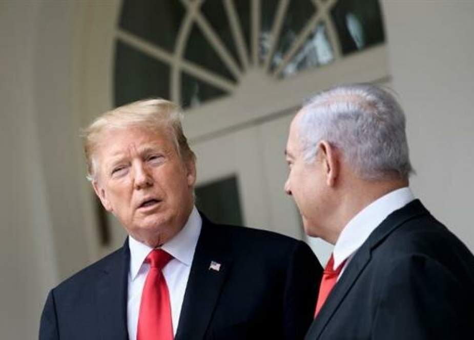 US President Donald Trump (L) and Israeli Prime Minister Benjamin Netanyahu talk while walking to the West Wing of the White House for a meeting on March 25, 2019. (AFP photo)