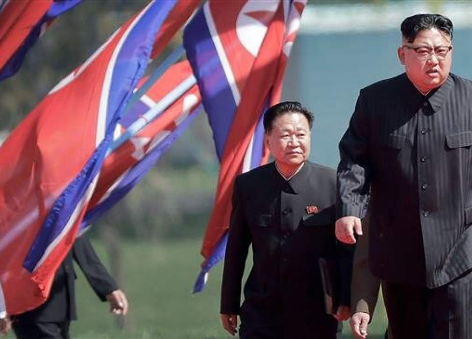 In this April 13, 2017 file photo, North Korean leader Kim Jong-un (R), and Choe Ryong Hae, vice-chairman of the central committee of the Workers