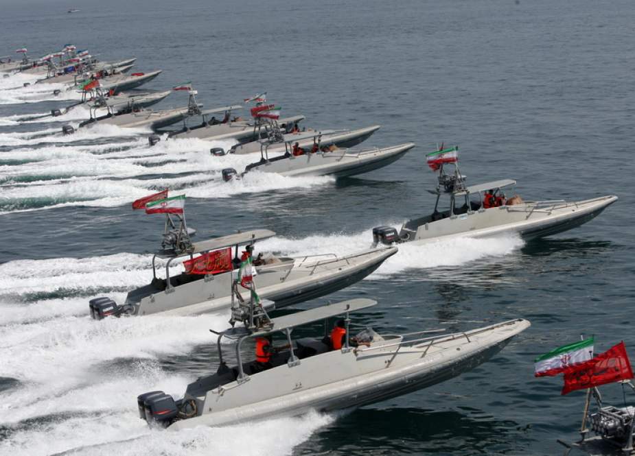 The file photo shows IRGC speedboats in the Persian Gulf