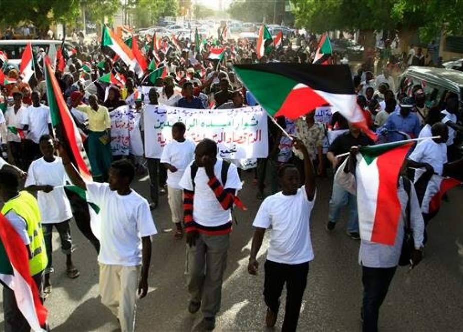 Sudanese demonstrators, from the Nuba mountains, take part in a demonstration in the capital Khartoum on May 1, 2019. (Photo by AFP)