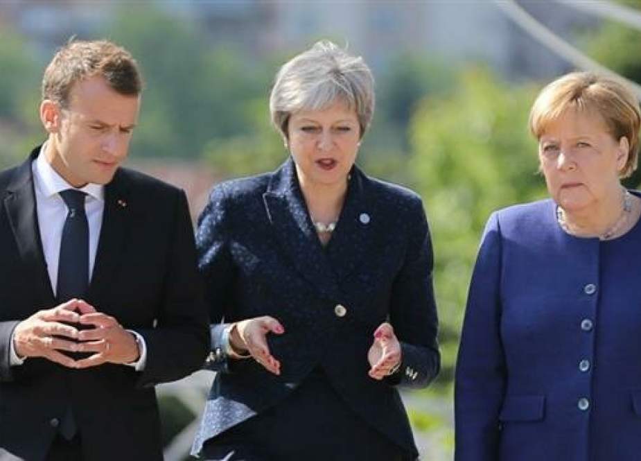 This Reuters file photo shows French President Emmanuel Macron (L), British Prime Minister Theresa May (C) and German Chancellor Angela Merkel.