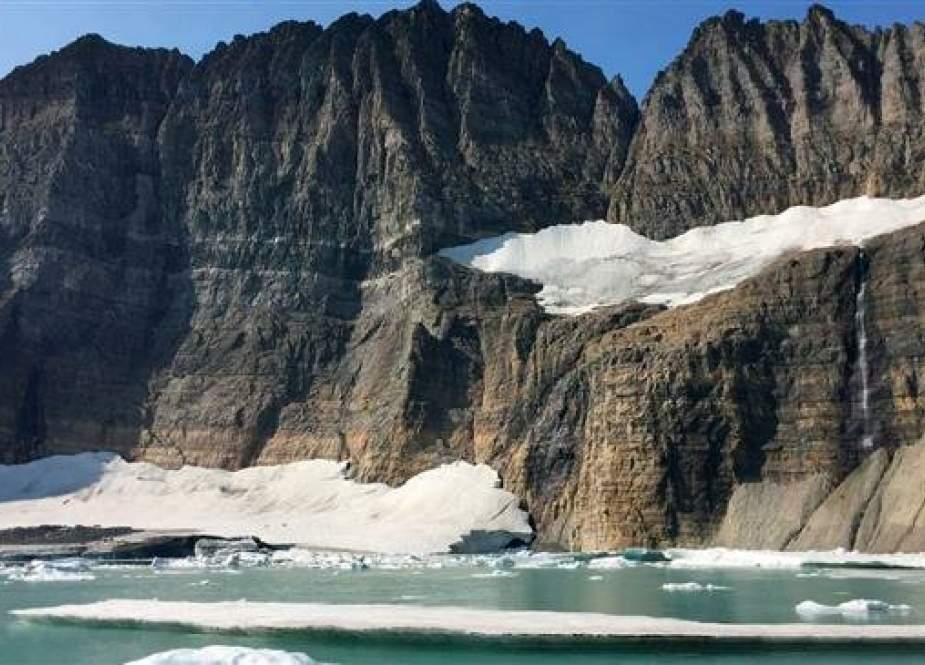 According to the National Park Service, Glacier National Park’s ice sheets are a fraction of the size they were 100 years ago. (Photo via AP)