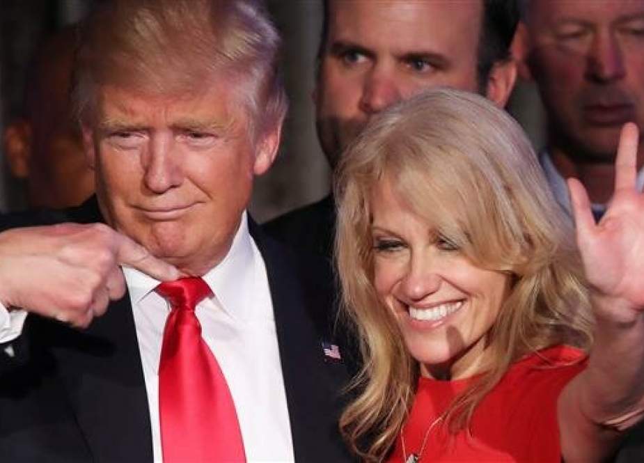 In this AFP file photo taken on November 09, 2016, then Republican president-elect Donald Trump and his campaign manager Kellyanne Conway acknowledge the crowd during his election night event at the New York Hilton Midtown in the early morning hours in New York City.